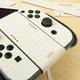 Illustration for article titled Wrapping My Nintendo Switch In Wood